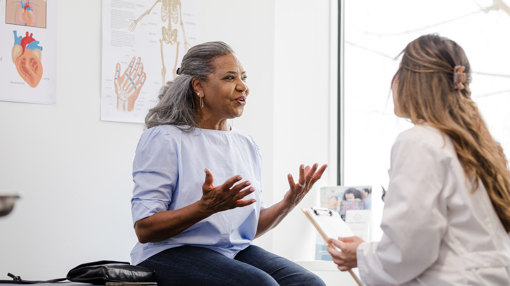 women talking to her doctor