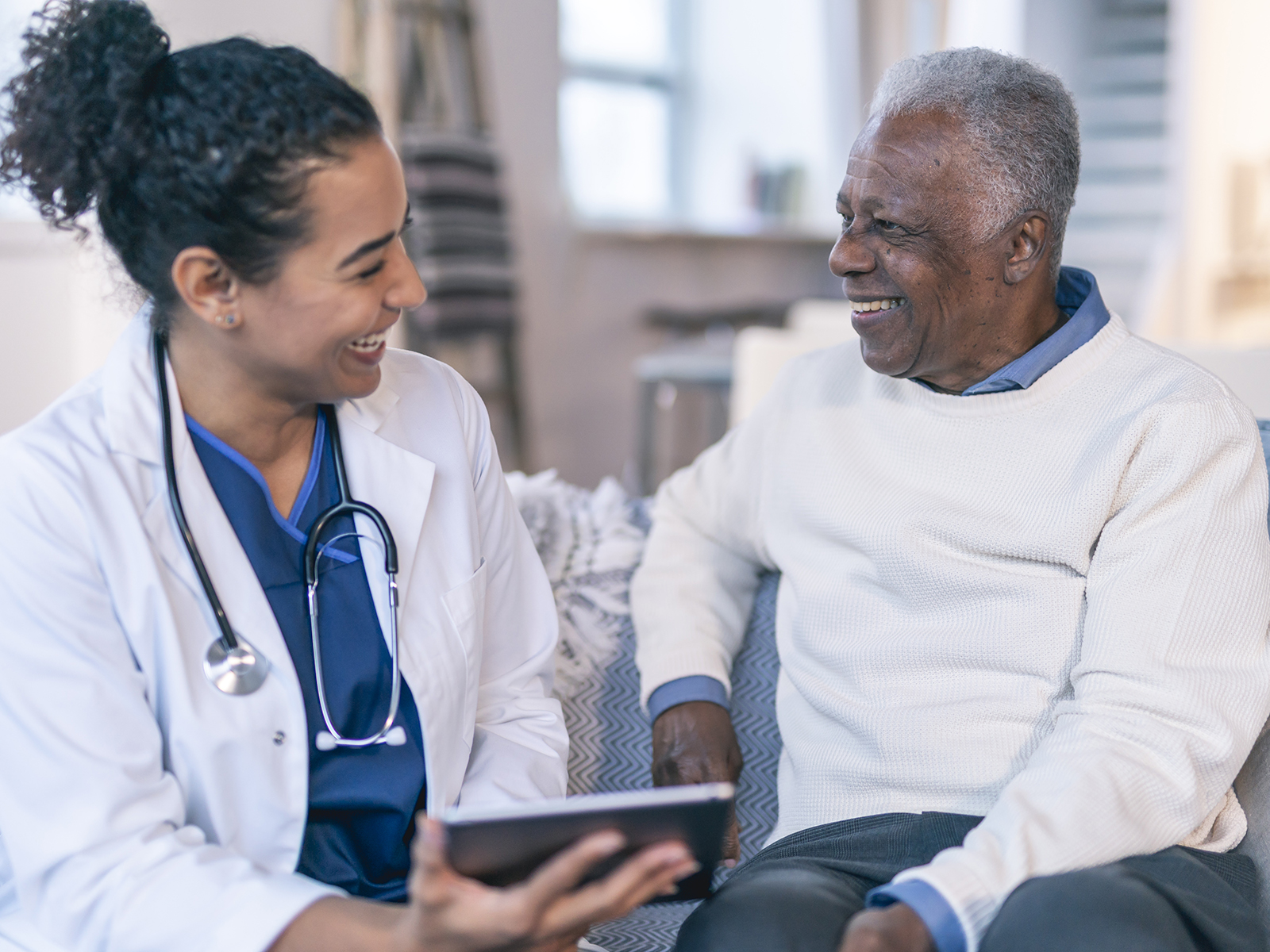 Senior man speaking with doctor